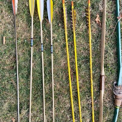 Lot 153: Paul Bunyan Long Bow & Vintage Archery set 