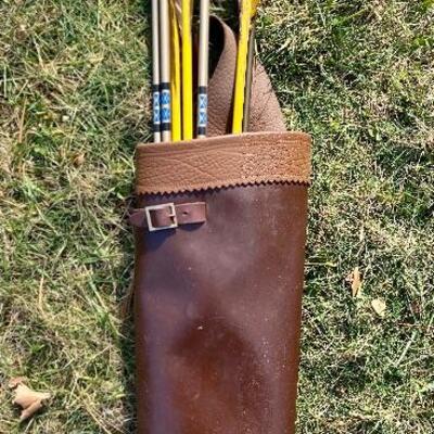 Lot 153: Paul Bunyan Long Bow & Vintage Archery set 
