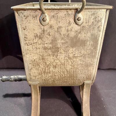 Lot 161: Cast Iron Paper Holder- Fries Sifter-Juicer and more. 