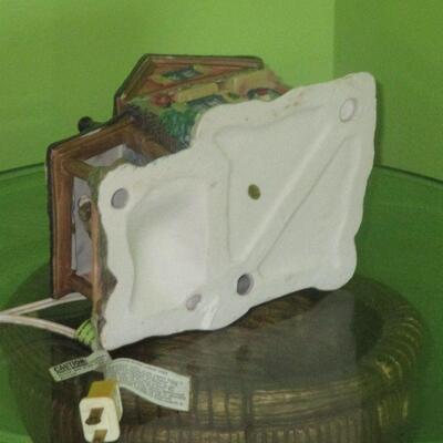 Lot 33 - Ceramic Cabin with Light