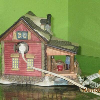 Lot 33 - Ceramic Cabin with Light