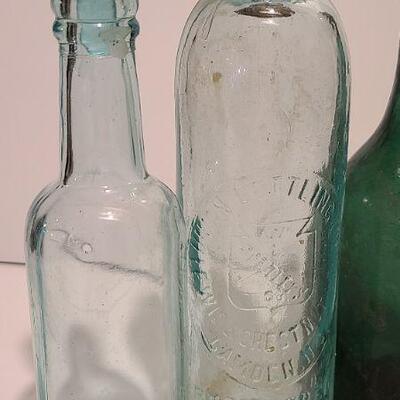 Lot 48: Amber, Green, Aqua Antique Bottles