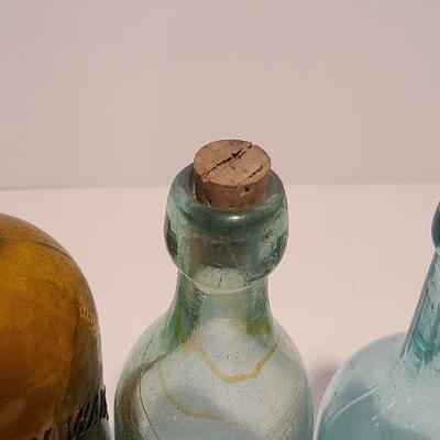 Lot 49B: Rare Spa bottle,  Amber Swirls Dyottville, McCrudden Glassworks 