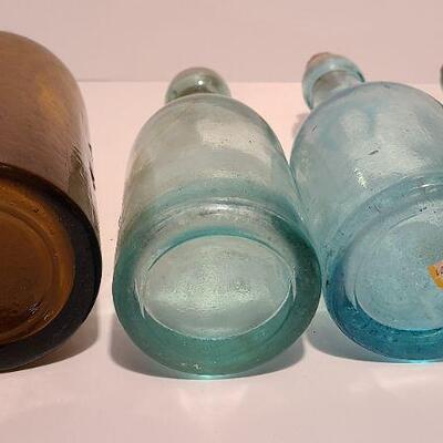 Lot 49B: Rare Spa bottle,  Amber Swirls Dyottville, McCrudden Glassworks 
