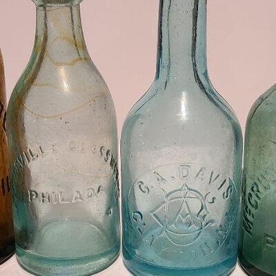 Lot 49B: Rare Spa bottle,  Amber Swirls Dyottville, McCrudden Glassworks 