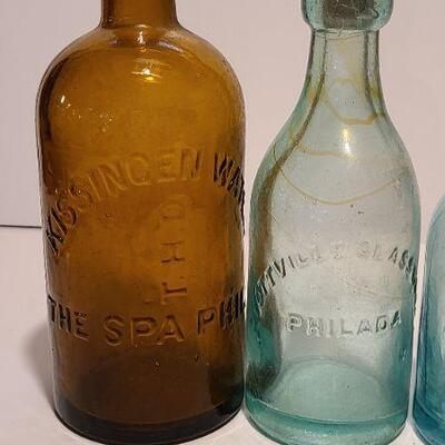 Lot 49B: Rare Spa bottle,  Amber Swirls Dyottville, McCrudden Glassworks 