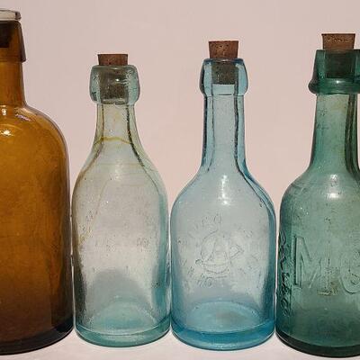 Lot 49B: Rare Spa bottle,  Amber Swirls Dyottville, McCrudden Glassworks 