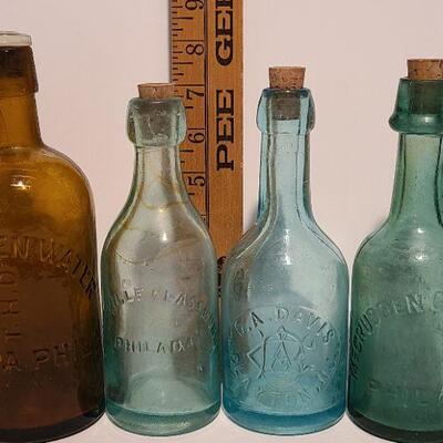 Lot 49B: Rare Spa bottle,  Amber Swirls Dyottville, McCrudden Glassworks 