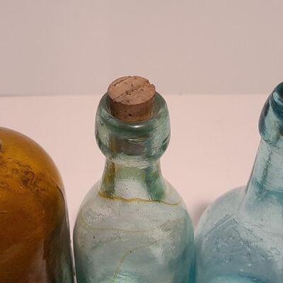 Lot 49B: Rare Spa bottle,  Amber Swirls Dyottville, McCrudden Glassworks 