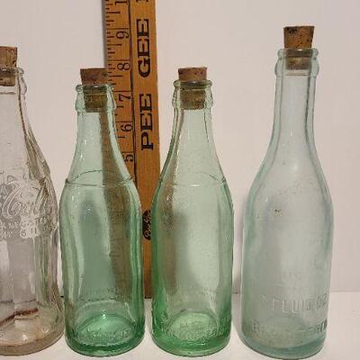 Lot 186: Coca-Cola Pepsi Antique Bottles 