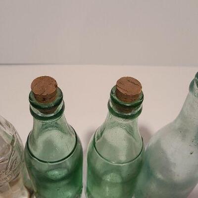 Lot 186: Coca-Cola Pepsi Antique Bottles 
