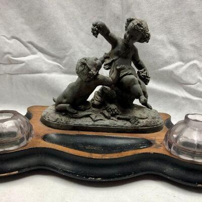 Antique Statuette on wood inkwell platform