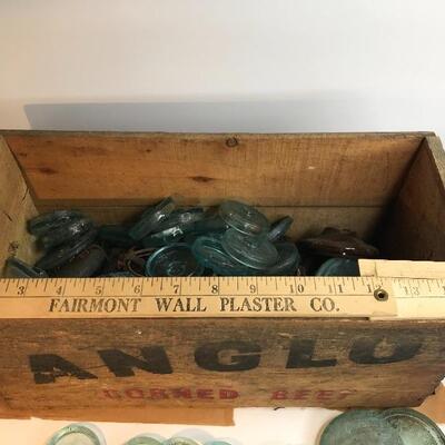 Lot 201:  Large lot Antique Glass Jar Lids/ Advertising Crate