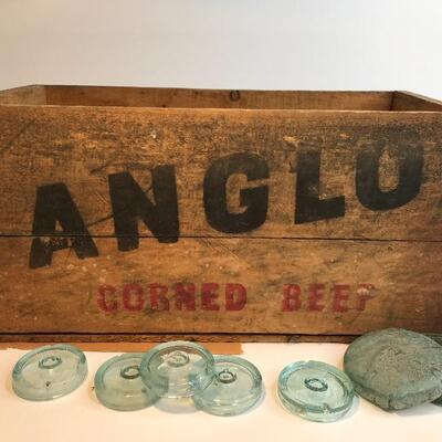 Lot 201:  Large lot Antique Glass Jar Lids/ Advertising Crate