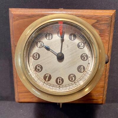 Lot 180: Vintage Brass Angled New Haven Ship's Clock and more 