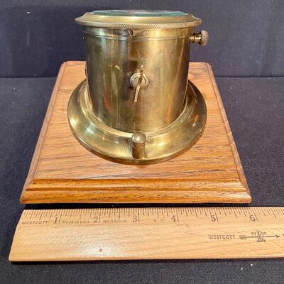 Lot 180: Vintage Brass Angled New Haven Ship's Clock and more 