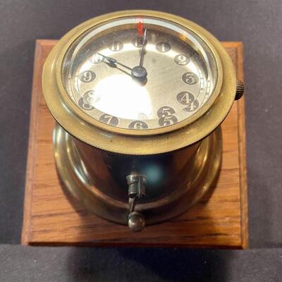 Lot 180: Vintage Brass Angled New Haven Ship's Clock and more 