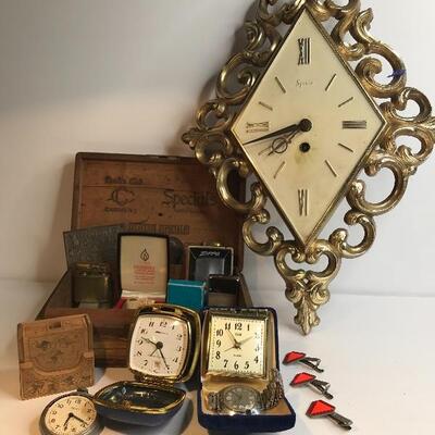 Lot 203:  Vintage Lighters, Clocks, 1928 Vendors License Plate. 