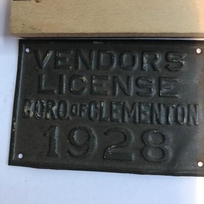 Lot 203:  Vintage Lighters, Clocks, 1928 Vendors License Plate. 