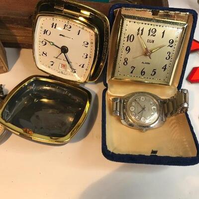 Lot 203:  Vintage Lighters, Clocks, 1928 Vendors License Plate. 