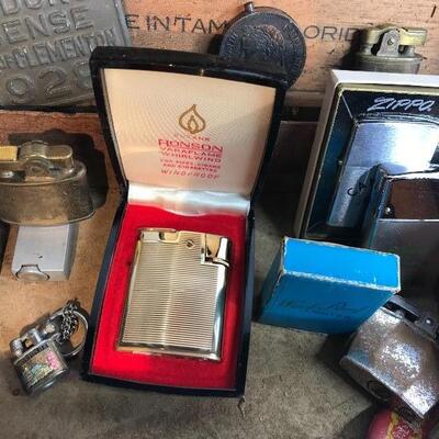 Lot 203:  Vintage Lighters, Clocks, 1928 Vendors License Plate. 