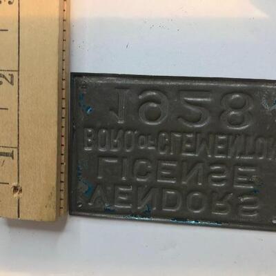 Lot 203:  Vintage Lighters, Clocks, 1928 Vendors License Plate. 