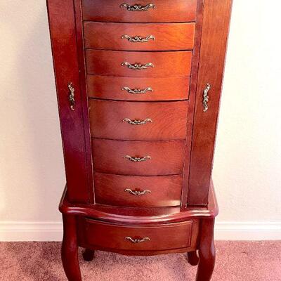 LOT 56  MAHOGANY FINISH STANDING JEWELRY CABINET