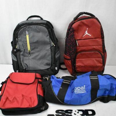 4 Bags: Gray Dell Backback, Red Jordan Backpack, Red lunch bag, Blue Ogio Duffle