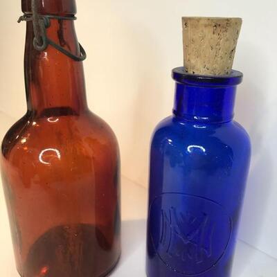 Lot 242: Colorful Glass Collectible Bottles 
