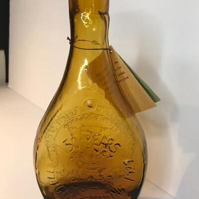 Lot 242: Colorful Glass Collectible Bottles 