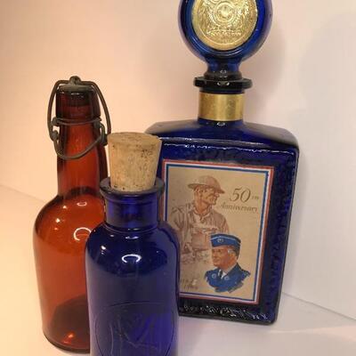 Lot 242: Colorful Glass Collectible Bottles 