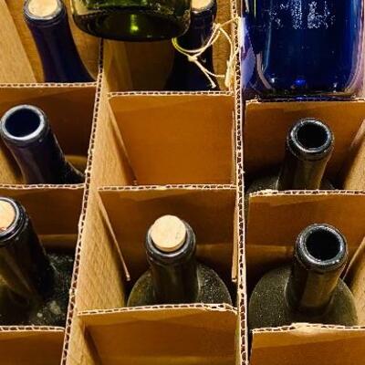 Lot 283: Vintage colored wine bottles 