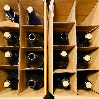 Lot 283: Vintage colored wine bottles 