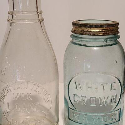 Lot 239: Antique Milk Bottles/Jars ( Gant Dairy Elmer, Moore Bros Mason, White Crown, and Boyd Mason)
