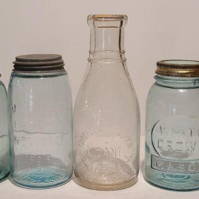 Lot 239: Antique Milk Bottles/Jars ( Gant Dairy Elmer, Moore Bros Mason, White Crown, and Boyd Mason)