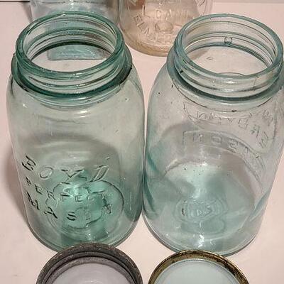 Lot 239: Antique Milk Bottles/Jars ( Gant Dairy Elmer, Moore Bros Mason, White Crown, and Boyd Mason)
