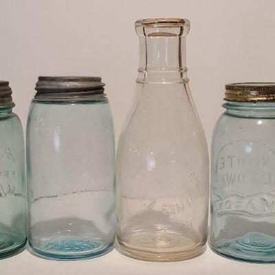 Lot 239: Antique Milk Bottles/Jars ( Gant Dairy Elmer, Moore Bros Mason, White Crown, and Boyd Mason)