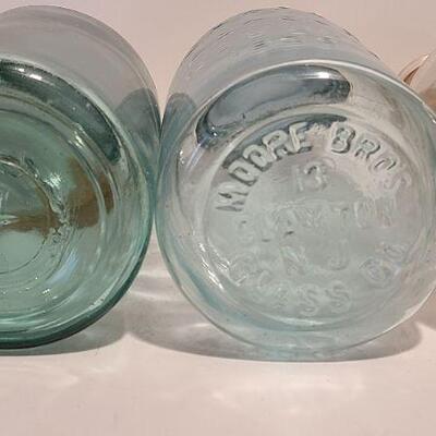 Lot 239: Antique Milk Bottles/Jars ( Gant Dairy Elmer, Moore Bros Mason, White Crown, and Boyd Mason)