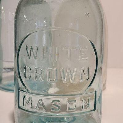 Lot 239: Antique Milk Bottles/Jars ( Gant Dairy Elmer, Moore Bros Mason, White Crown, and Boyd Mason)