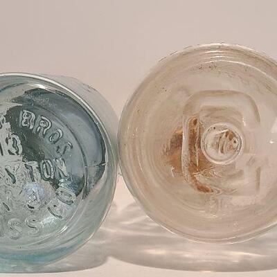 Lot 239: Antique Milk Bottles/Jars ( Gant Dairy Elmer, Moore Bros Mason, White Crown, and Boyd Mason)