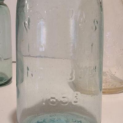 Lot 239: Antique Milk Bottles/Jars ( Gant Dairy Elmer, Moore Bros Mason, White Crown, and Boyd Mason)