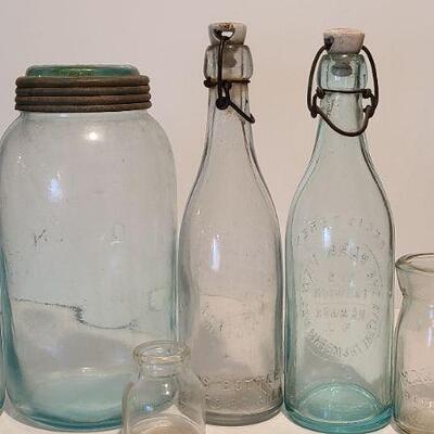 Lot 237: Antique Bottles/Jars ( Large The QUEEN, Zimmer Gloucester, Parkview Newark, Moore Mason)