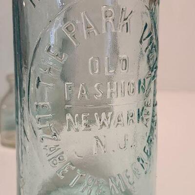Lot 237: Antique Bottles/Jars ( Large The QUEEN, Zimmer Gloucester, Parkview Newark, Moore Mason)