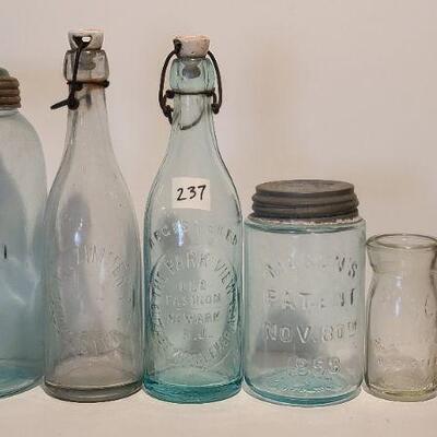 Lot 237: Antique Bottles/Jars ( Large The QUEEN, Zimmer Gloucester, Parkview Newark, Moore Mason)