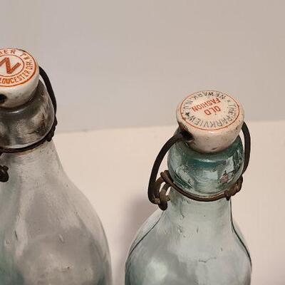 Lot 237: Antique Bottles/Jars ( Large The QUEEN, Zimmer Gloucester, Parkview Newark, Moore Mason)