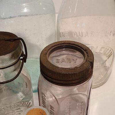 Lot 235: Antique Bottles/Jars ( Borden purple, Coleman Dairy, Whitman VT) 