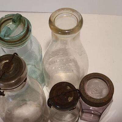 Lot 235: Antique Bottles/Jars ( Borden purple, Coleman Dairy, Whitman VT) 