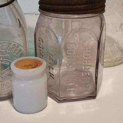 Lot 235: Antique Bottles/Jars ( Borden purple, Coleman Dairy, Whitman VT) 