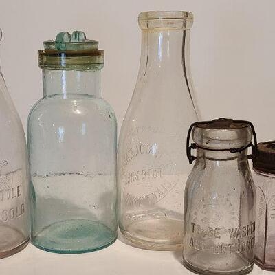 Lot 235: Antique Bottles/Jars ( Borden purple, Coleman Dairy, Whitman VT) 