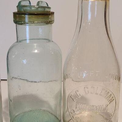 Lot 235: Antique Bottles/Jars ( Borden purple, Coleman Dairy, Whitman VT) 